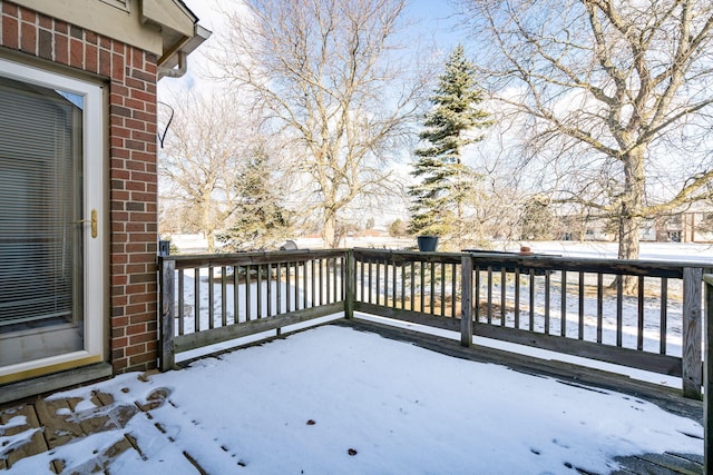 view of snow covered deck