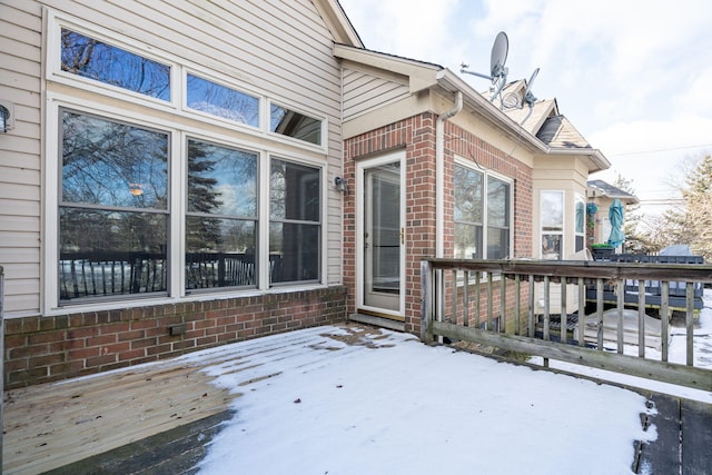 view of snow covered deck