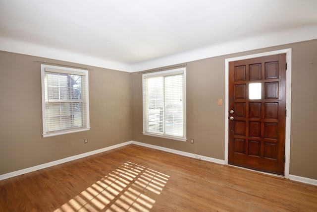 foyer with light hardwood / wood-style floors