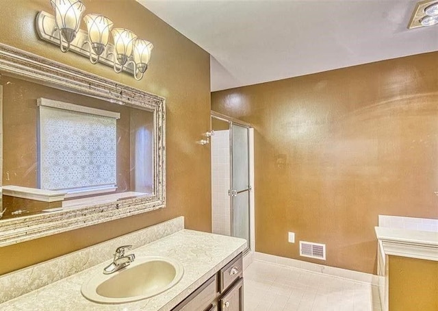 bathroom featuring vanity and walk in shower