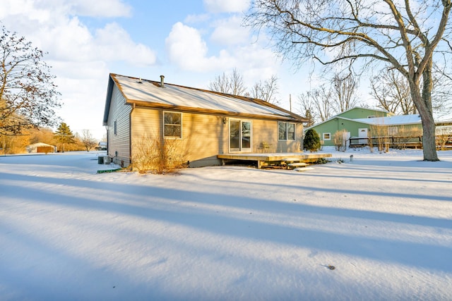 view of snow covered property