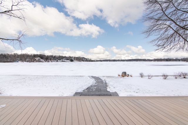 view of snow covered deck