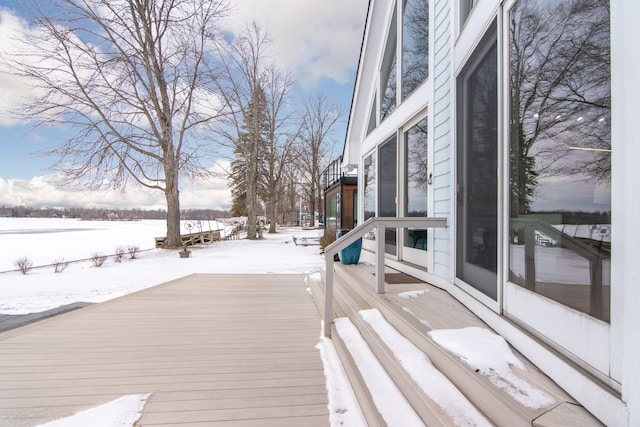 view of snow covered deck