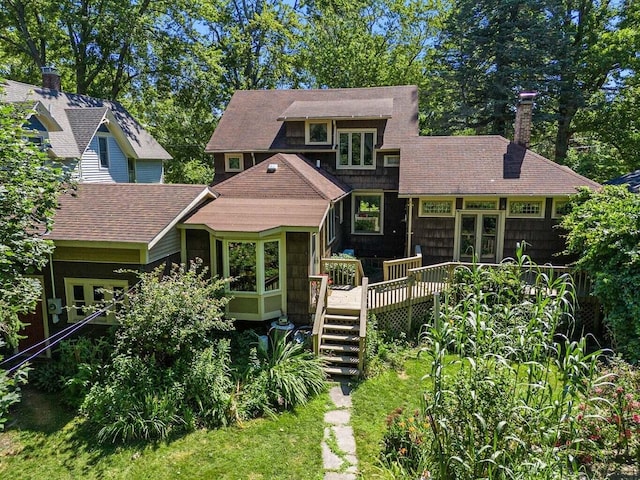 view of front of home with a wooden deck