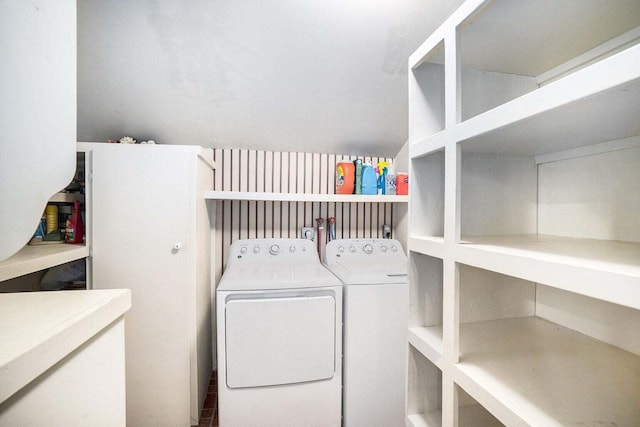 laundry area with separate washer and dryer