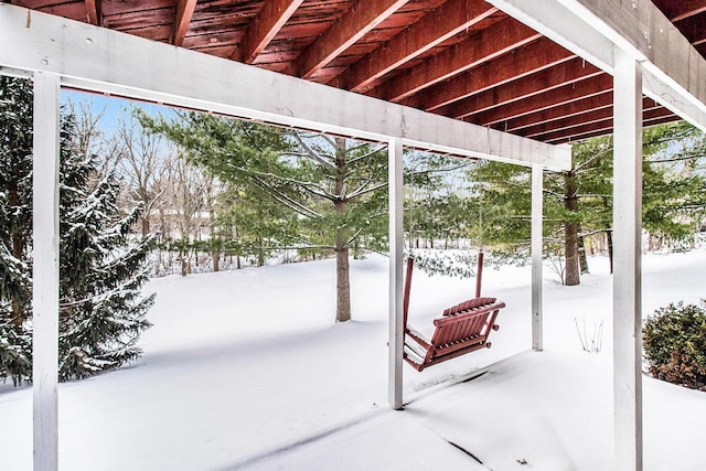 view of snow covered patio