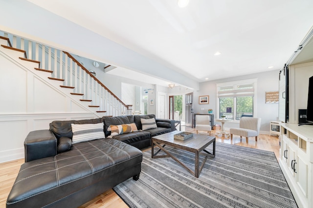 living room with light hardwood / wood-style flooring