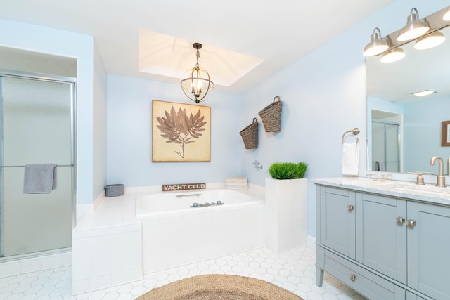 bathroom featuring plus walk in shower, tile patterned floors, a notable chandelier, and vanity