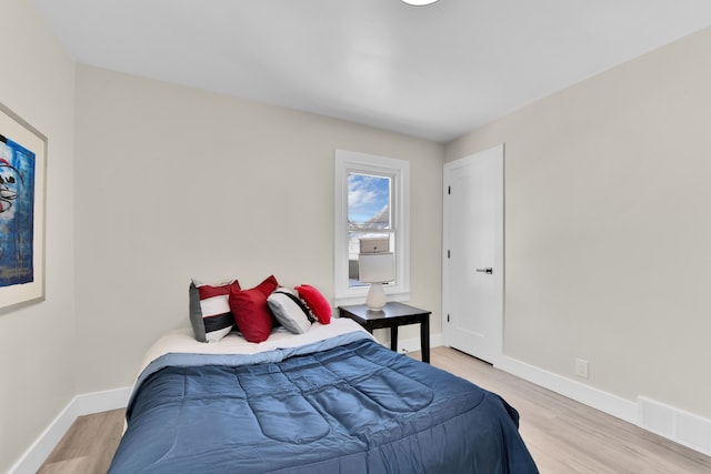 bedroom with light hardwood / wood-style floors