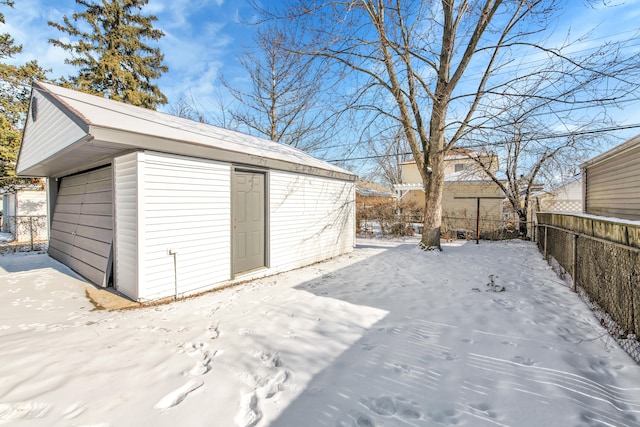 view of snow covered garage