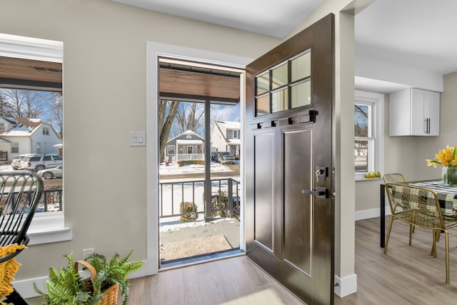 doorway to outside featuring light hardwood / wood-style flooring