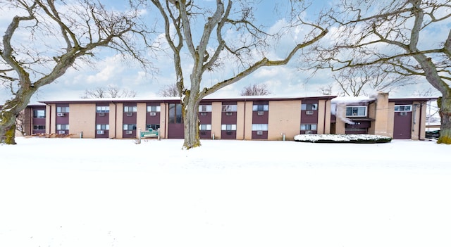 view of snow covered building