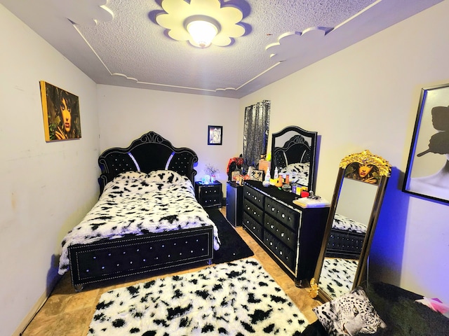 bedroom with a textured ceiling