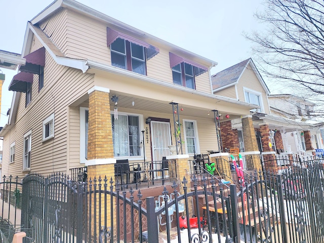 view of front of property featuring covered porch