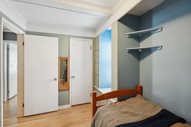 bedroom with light hardwood / wood-style floors