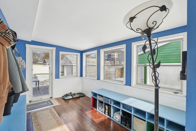 interior space featuring lofted ceiling and hardwood / wood-style floors