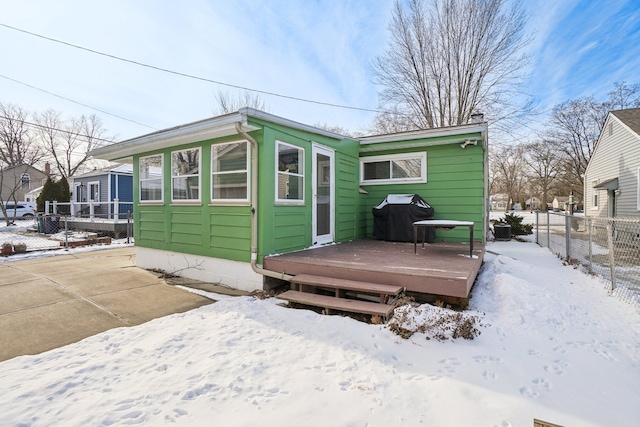 view of snow covered property