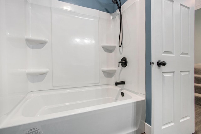 bathroom with shower / bath combination