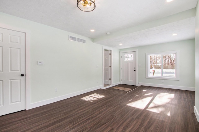 interior space with dark hardwood / wood-style floors