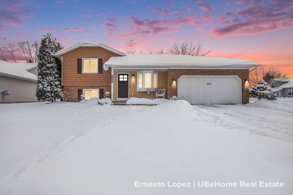 split level home with a garage