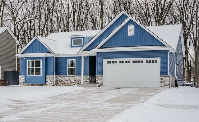 craftsman house with a garage