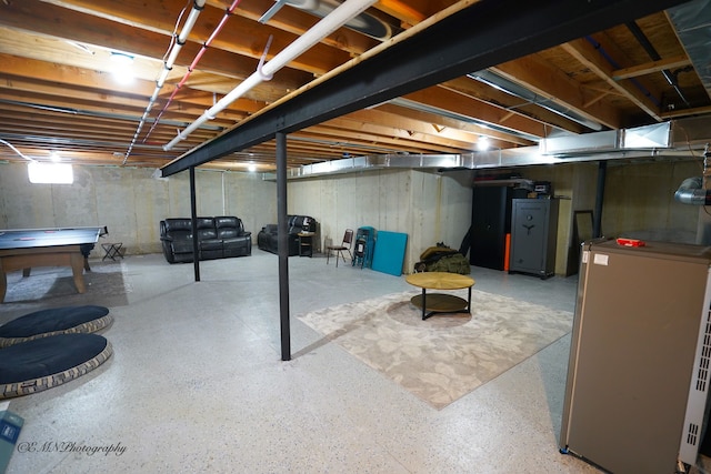 basement featuring heating unit