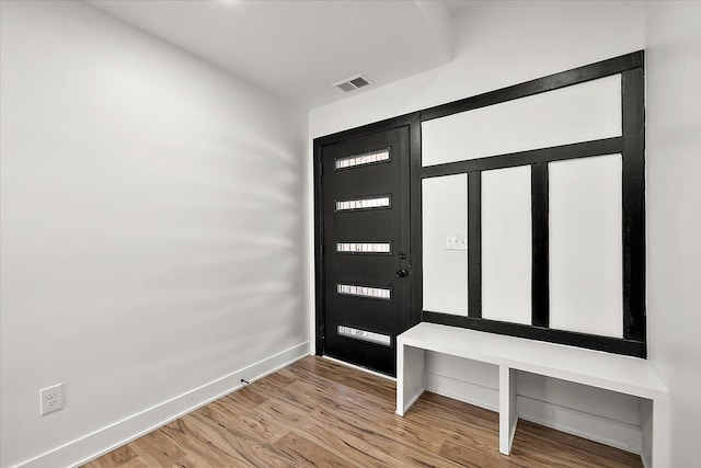 entrance foyer with hardwood / wood-style floors