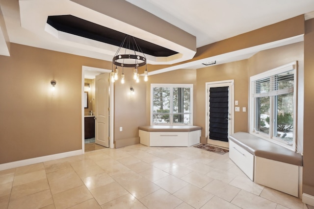 372 Overlook Dr, Oxford, MI 48371 - unfurnished dining area featuring plenty of natural light, baseboards, and a raised ceiling