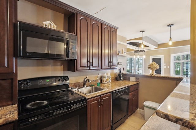 372 Overlook Dr, Oxford, MI 48371 - kitchen with open shelves, light tile patterned floors, a sink, black appliances, and hanging light fixtures