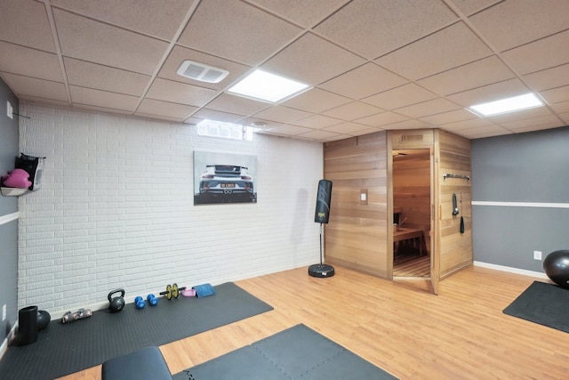 372 Overlook Dr, Oxford, MI 48371 - workout room with visible vents, a paneled ceiling, wood finished floors, and baseboards