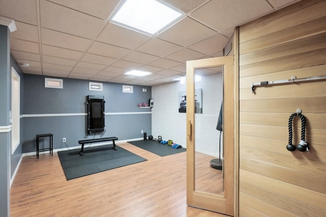 372 Overlook Dr, Oxford, MI 48371 - exercise room with baseboards, wood finished floors, and a drop ceiling