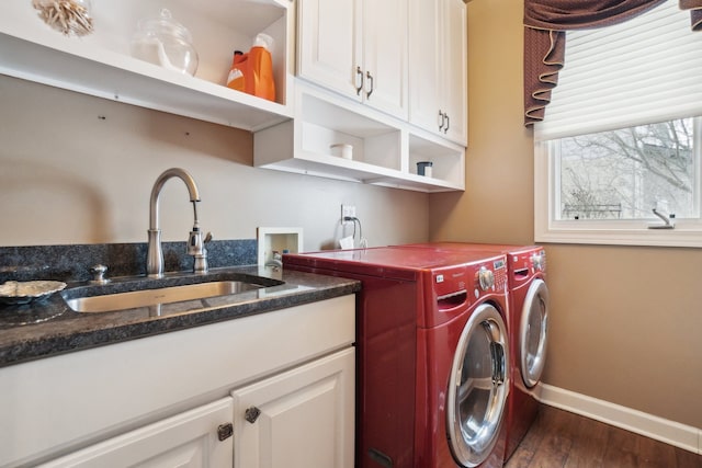 372 Overlook Dr, Oxford, MI 48371 - laundry room with a sink, dark wood-type flooring, baseboards, washer and dryer, and cabinet space