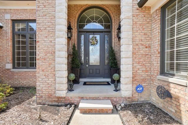 372 Overlook Dr, Oxford, MI 48371 - doorway to property with brick siding