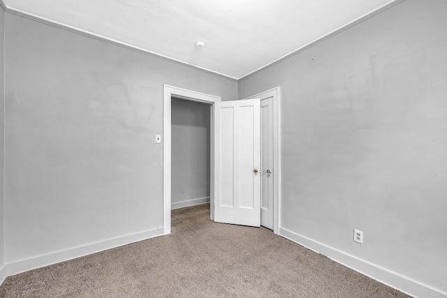 unfurnished bedroom featuring carpet