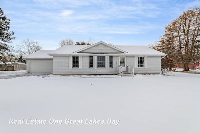 ranch-style house featuring a garage