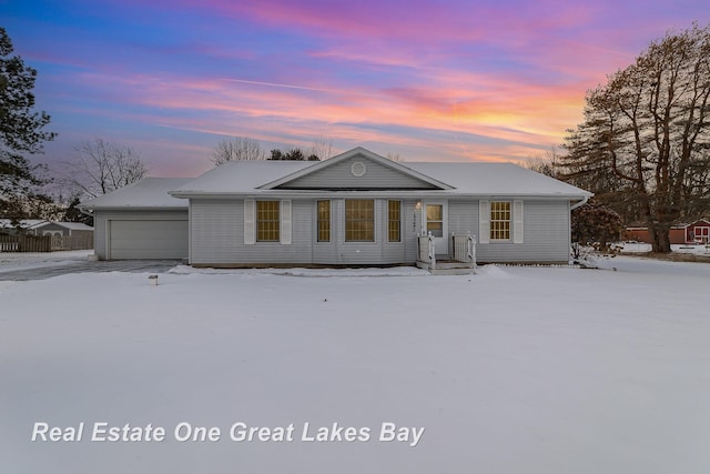 single story home with a garage