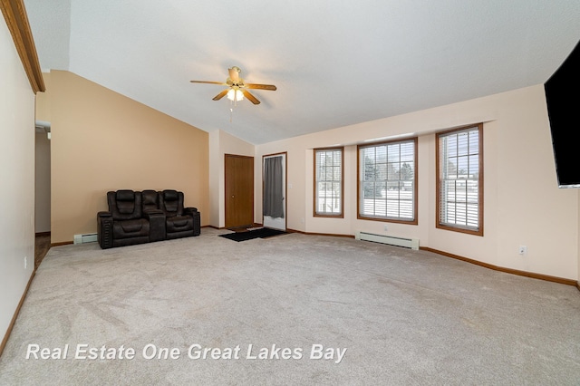 unfurnished living room with ceiling fan, a baseboard heating unit, light carpet, and vaulted ceiling