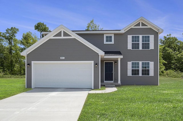 view of front of property with a garage and a front lawn