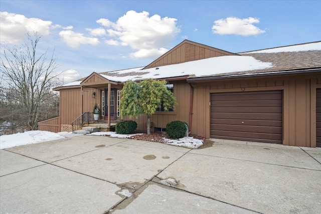 single story home featuring a garage