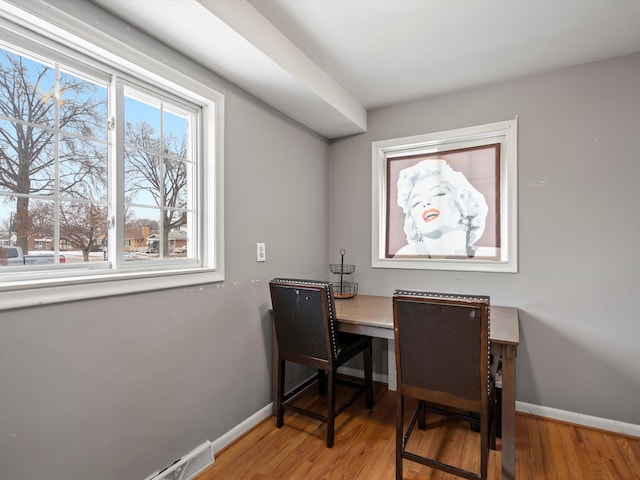 office area with hardwood / wood-style flooring