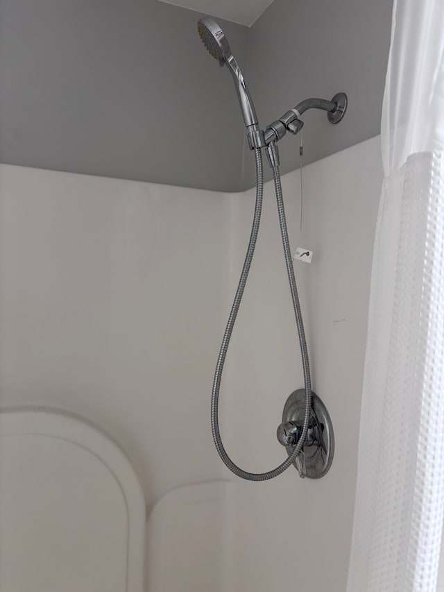 details with curtained shower