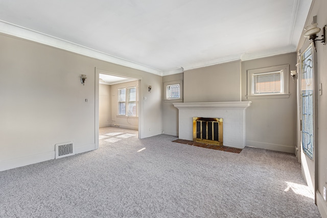 unfurnished living room with light colored carpet, ornamental molding, and a fireplace