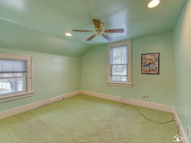 bonus room featuring carpet floors, vaulted ceiling, and ceiling fan