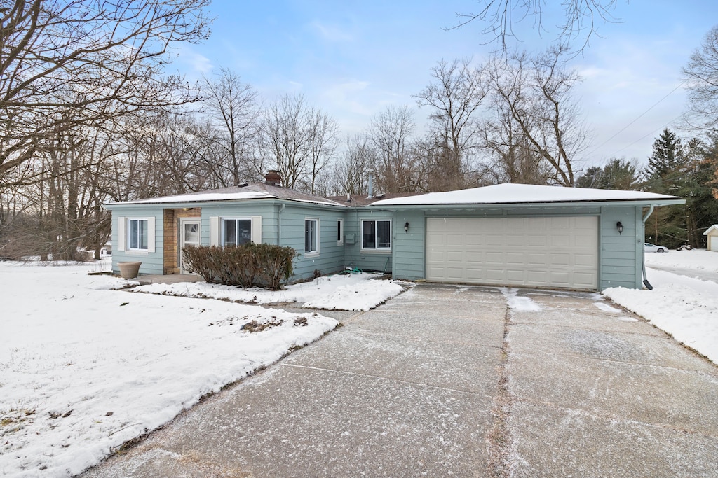 single story home with a garage