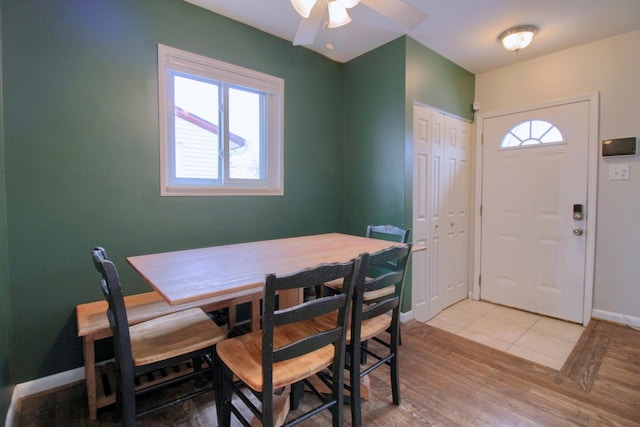 dining space featuring a healthy amount of sunlight, light hardwood / wood-style flooring, and ceiling fan