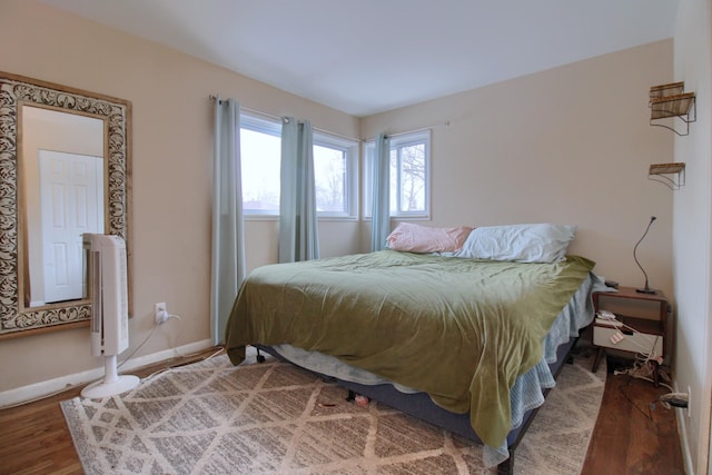 bedroom featuring hardwood / wood-style flooring