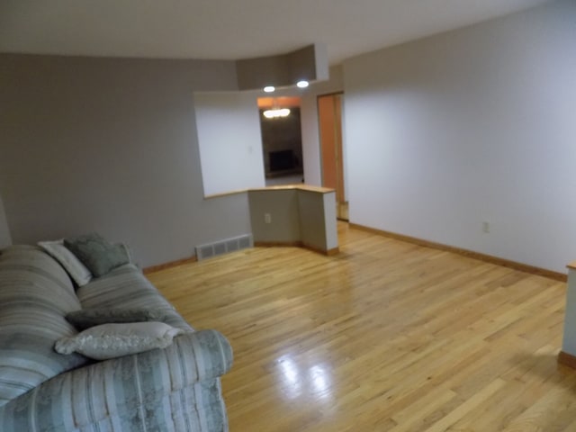 unfurnished living room featuring light hardwood / wood-style floors