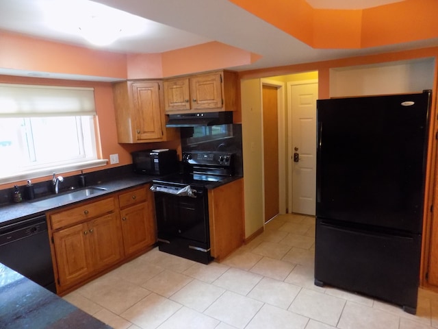 kitchen with sink and black appliances