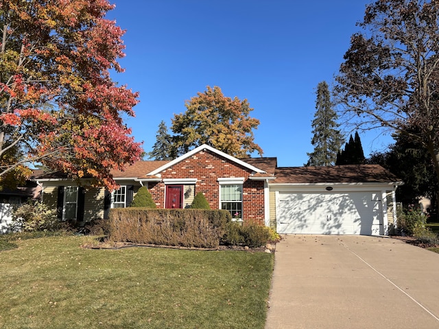 single story home with a front yard and a garage