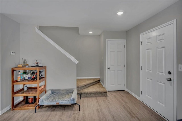 entrance foyer with light hardwood / wood-style floors